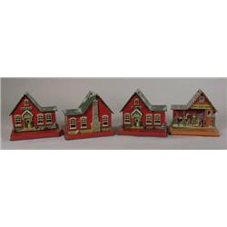 Four Marx tin toy sucker holders