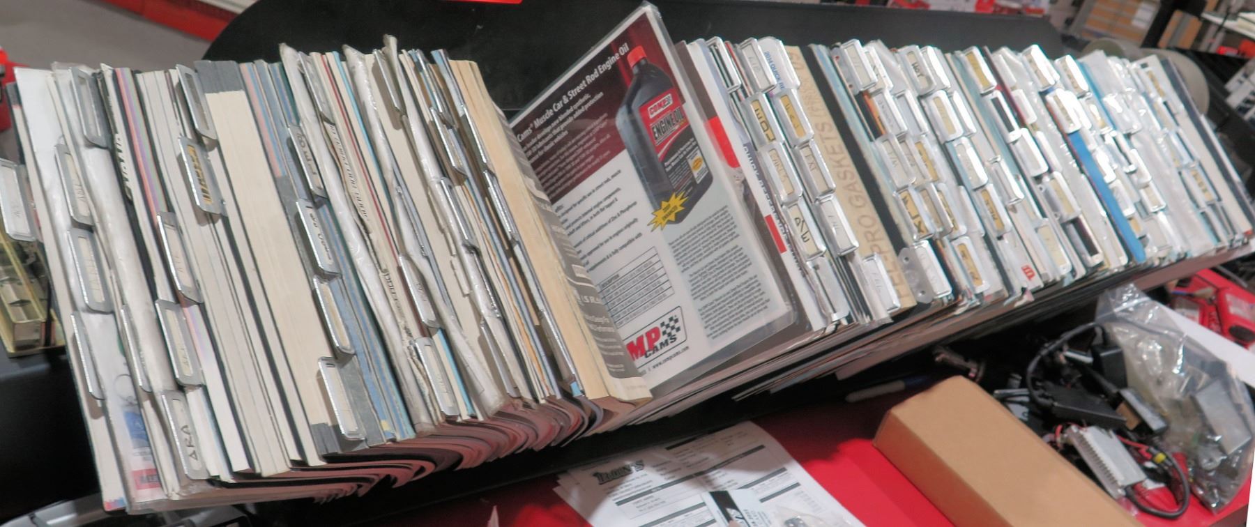 Auto Part Catalog Rack w/ Multiple Misc Vintage Parts Books