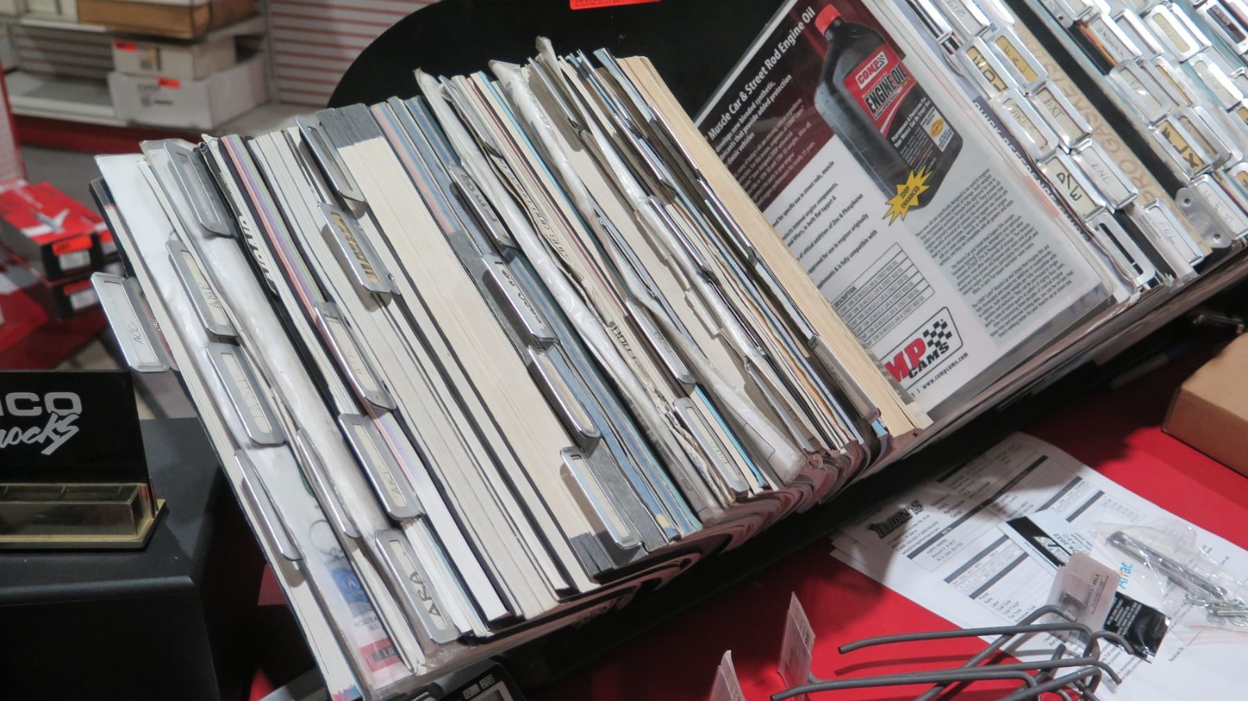 Auto Part Catalog Rack w/ Multiple Misc Vintage Parts Books