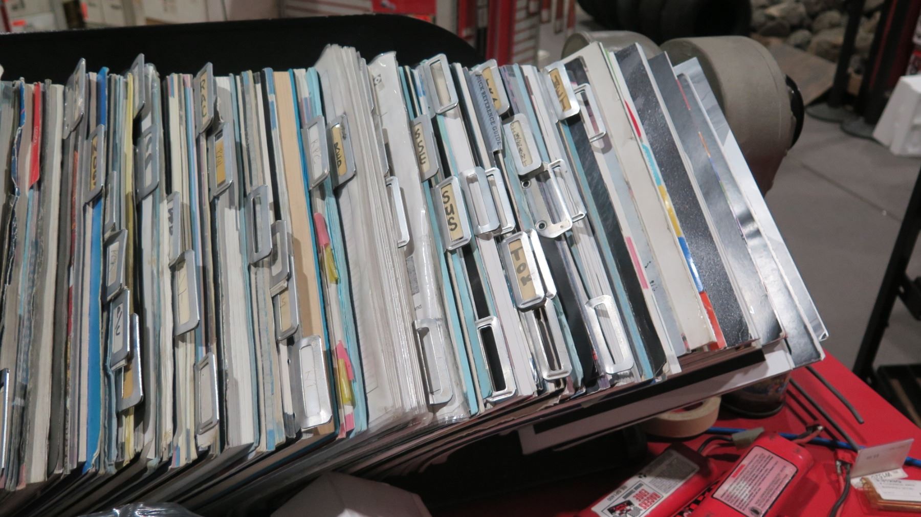 Auto Part Catalog Rack w/ Multiple Misc Vintage Parts Books