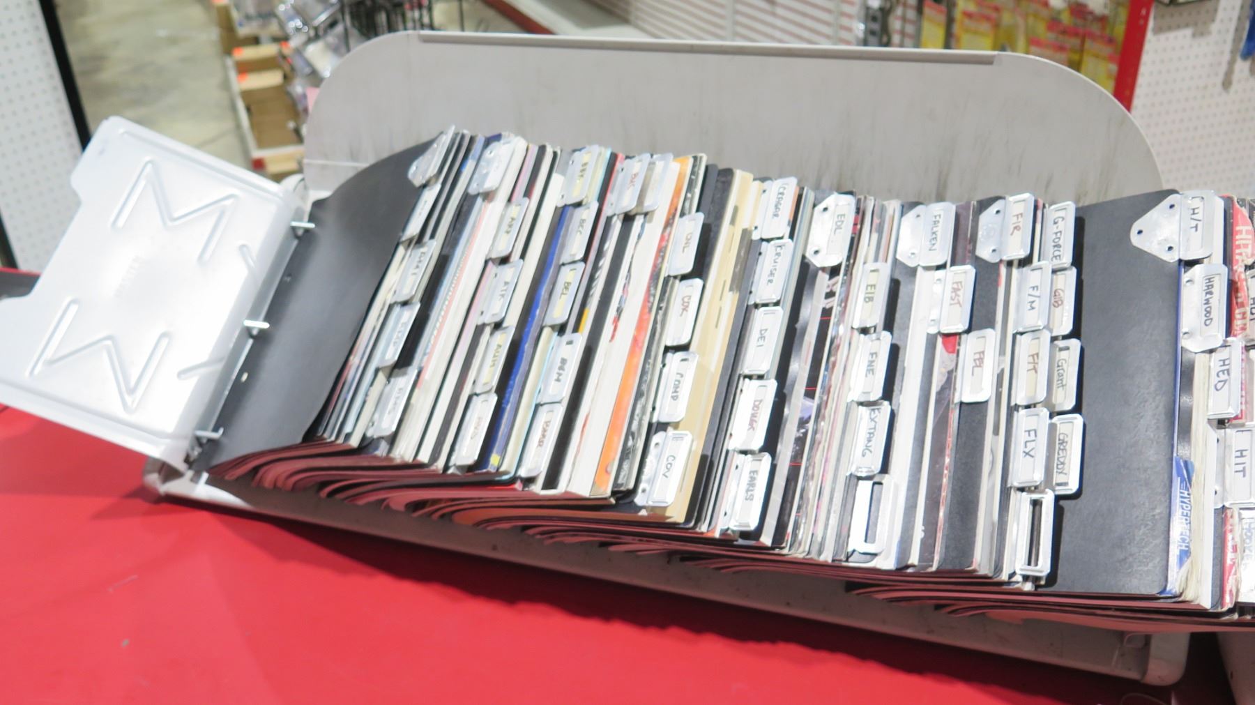 Auto Part Catalog Rack w/ Multiple Misc Vintage Parts Books & Stickers