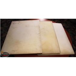 THREE LARGE WHITE CUTTING BOARDS