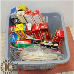 LAUNDRY BASKET OF ALUMINUM FOIL AND PARCHMENT