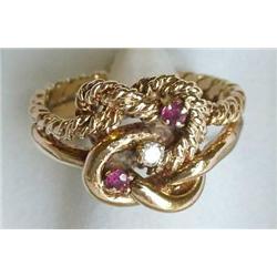 Ladies' diamond and ruby love knot ring