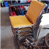 Image 1 : 4 METAL STACKING CHIARS W/ YELLOW CUSHIONS