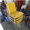 Image 2 : 4 METAL STACKING CHIARS W/ YELLOW CUSHIONS