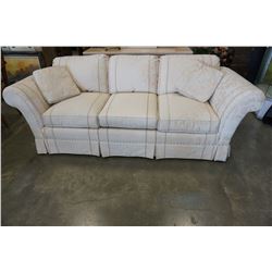 ROLLED ARM WHITE FABRIC SOFA BY CLAYTON MARCUS FURNITURE