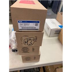 4 Boxes of Ford Latches Part#  FL3Z-18264A-01-D, Ford Bushings Part#  8A8Z-5A638-C, Ford Plug Part# 