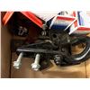 Image 12 : trailer breakaway kit; wheel chocks; oil filters; air brake adapter; marine instrument; slide hammer
