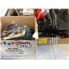 Image 1 : trailer breakaway kit; wheel chocks; oil filters; air brake adapter; marine instrument; slide hammer