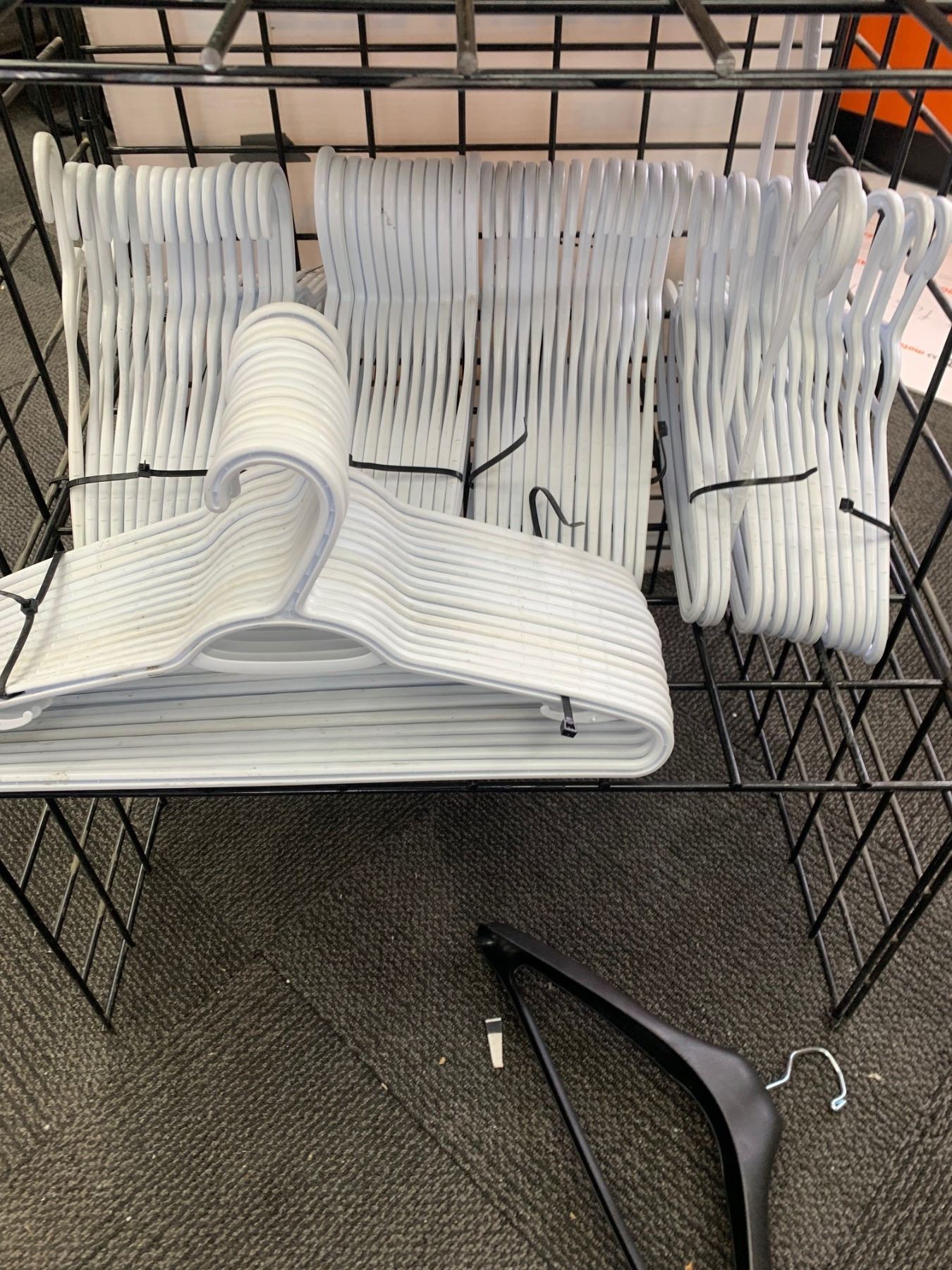 wire shelving rack, coat hangers, CAT5e riser cable