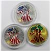Image 1 : THREE COLORIZED AMERICAN SILVER EAGLES