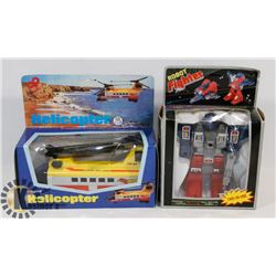 A PAIR OF VINTAGE NEW IN BOX TOYS-ROBOT FIGHTER &