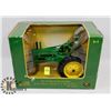 Image 1 : JOHN DEERE MODEL "A" WITH MAN DIE CAST TRACTOR
