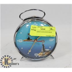 1950S ALARM CLOCK WITH SEAL.