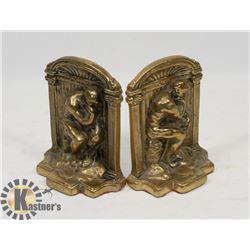 A PAIR OF SOLID BRASS MARKED "CANADA" BOOK ENDS
