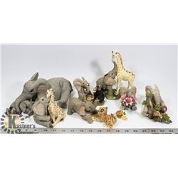 LOT OF 8 ASSORTED TUSKERS FIGURINES.