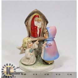 GOEBEL GIRL WITH AN ANGEL FIGURE