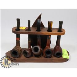 PIPE RACK WITH FIVE VINTAGE TOBACCO PIPES
