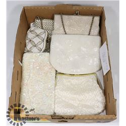 BOX WITH 5 BEADED SILK BAGS.