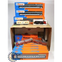 BOX OF ROCO AND OTHERS TRAIN CARS HO SCALE