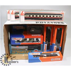 BOX OF MOSTLY LIMA  AND ROCO HO TRAIN CARS