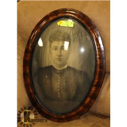 OVAL CONVEX BUBBLE GLASS FRAMED PICTURE.