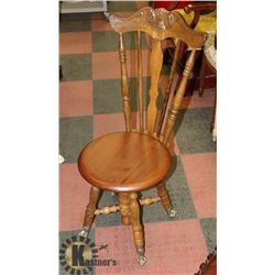 VINTAGE PIANO CHAIR WITH BRASS CLAW FEET