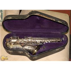 1914 WHALEY ROYCE SAXOPHONE WITH CASE.
