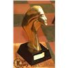 Image 1 : BRASS WOMANS FACE ON A WOODEN STAND
