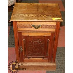 ANTIQUE OAK CARVED END TABLE. 17.5" X 13.5" X 26"