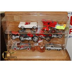 DISPLAY WITH DIECAST MOTORCYCLES, CARS AND MORE.