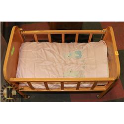 VINTAGE METAL DOLL CRIB.