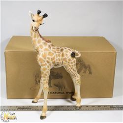 THE NATURAL WORLD HANDPAINTED GIRAFFE FIGURE.
