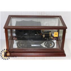 MODEL VINTAGE CAR IN DISPLAY.