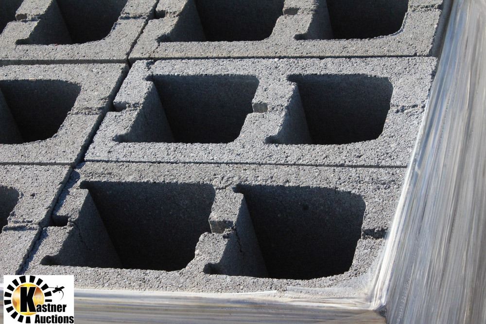 PALLET OF GREY UTILITY KNOCKOUT CONCRETE BLOCK