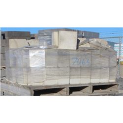PALLET OF BEIGE ANGLED CONCRETE BLOCKS