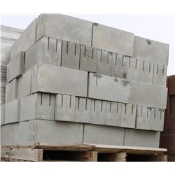 PALLET OF LIGHT GREY KNOCKOUT BOND BEAM BLOCKS