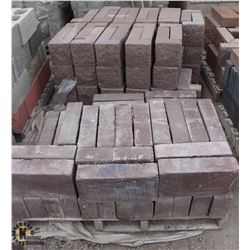 2 PALLET OF DARK RED SPLIT FACED BLOCKS SOLD W/