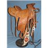 Image 1 : Ray Holes, (Grangeville, Idaho)  saddle, fancy flower tooled w/matching silver mtd bridle