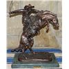 Image 2 : Remington, Frederic, Bronc Buster recast bronze, 15" w x 21" h