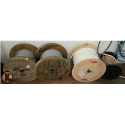 TWO PARTIAL ROLLS OF STEEL CABLE AND