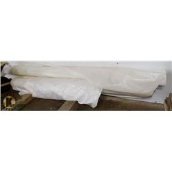TWO HUGE ROLLS OF TARP LIKE MATERIAL