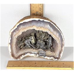 4)  QUARTZ GEODE WITH A GOLD MINER'S