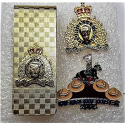 8)  VINTAGE RCMP MONEY CLIP AND 2