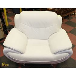 LEATHER CHAIR - SMALL TEAR IN ARM.