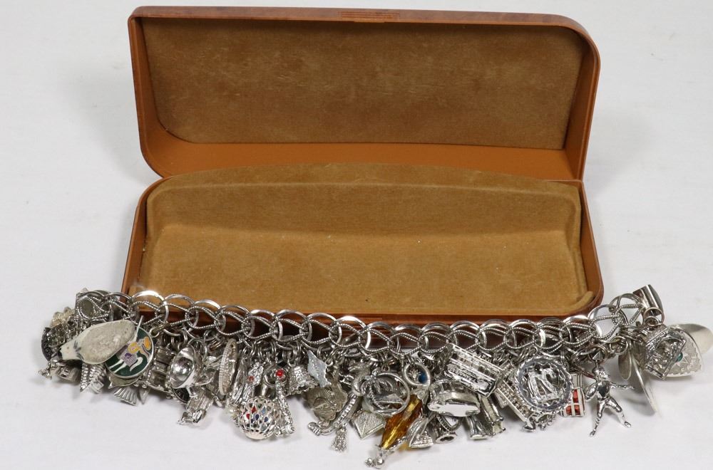 1970S STERLING SILVER CHARM BRACELET WITH LARGE - Kastner Auctions