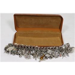 1970S STERLING SILVER CHARM BRACELET WITH LARGE