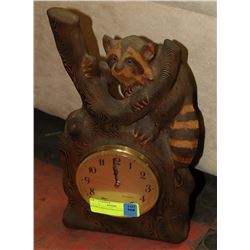 HAND CARVED RACCOON CLOCK