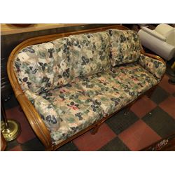 WOOD AND WICKER FLORAL SOFA